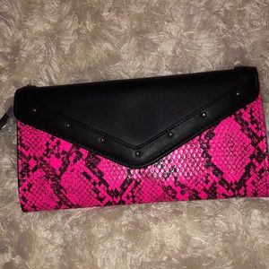 small handbag with attached wallet